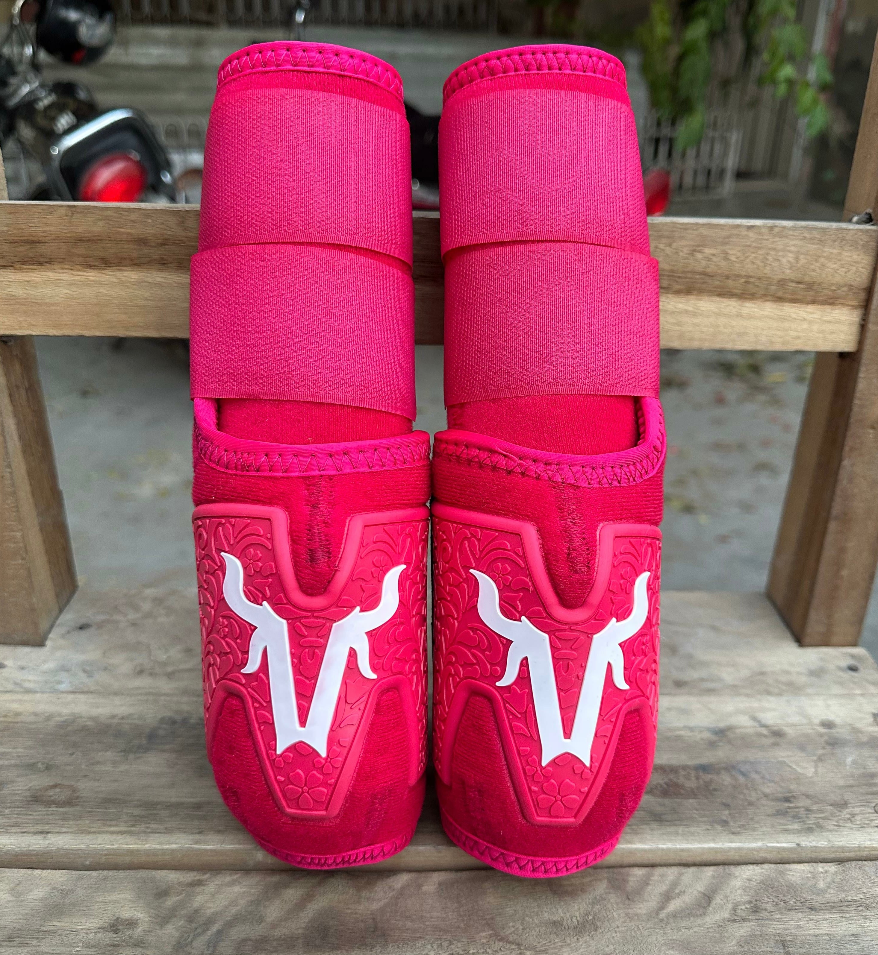 Neon pink splint boots
