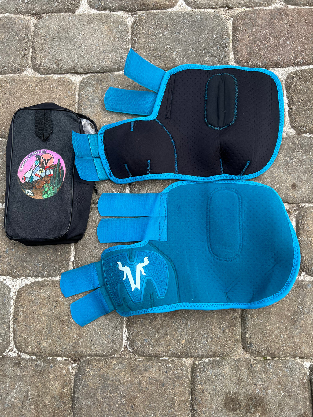 Teal splint boots