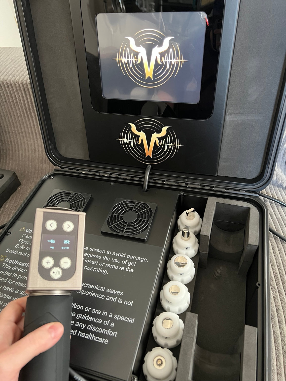 VanHorn equine shockwave therapy handpiece with onboard controls and touchscreen system